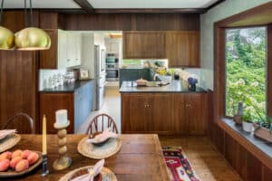 Wood panels and metal cabinets in retro kitchen in RI