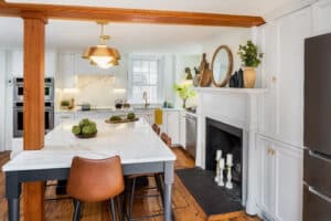 The new kitchen design responds to the old home's original character
