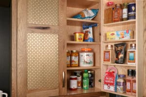 door mounted spice racks keep the spice cabinet tidy