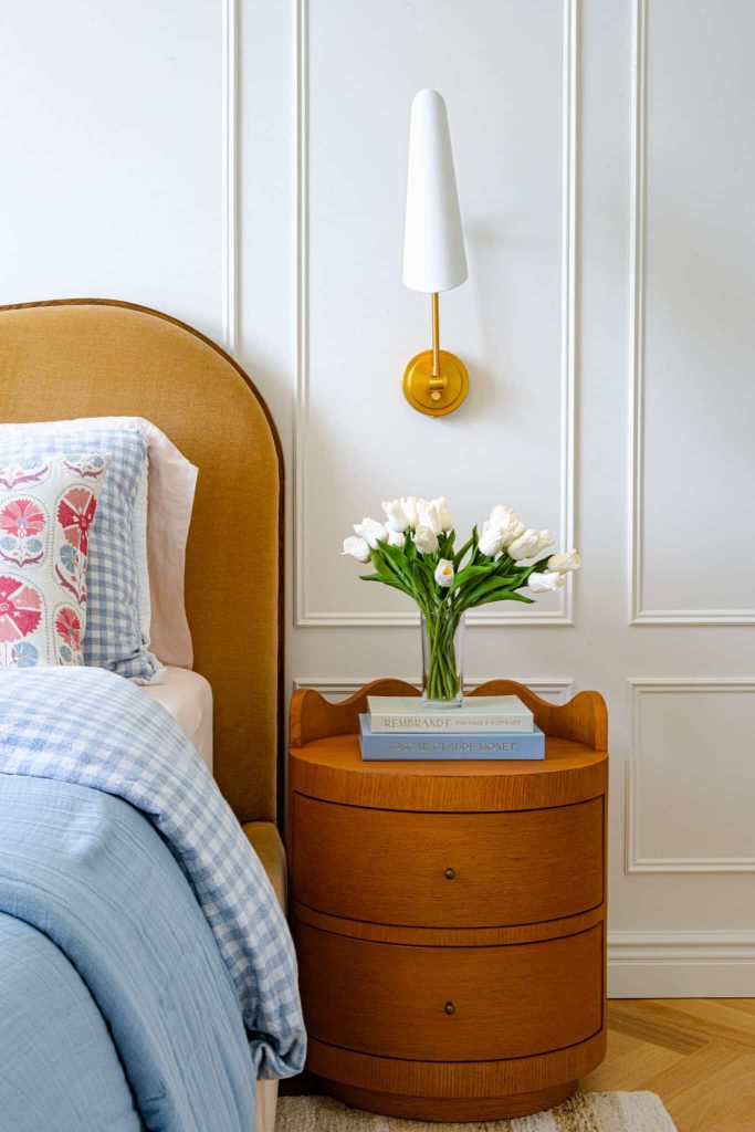 Detailed wall trim in French Modern living room